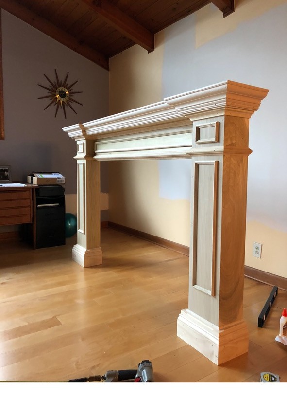 Custom fireplace mantel by Derme Family Remodeling